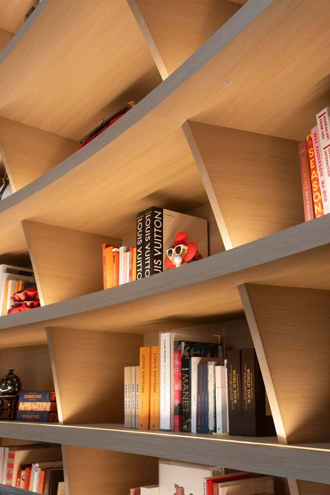 Tall library shelves full of books