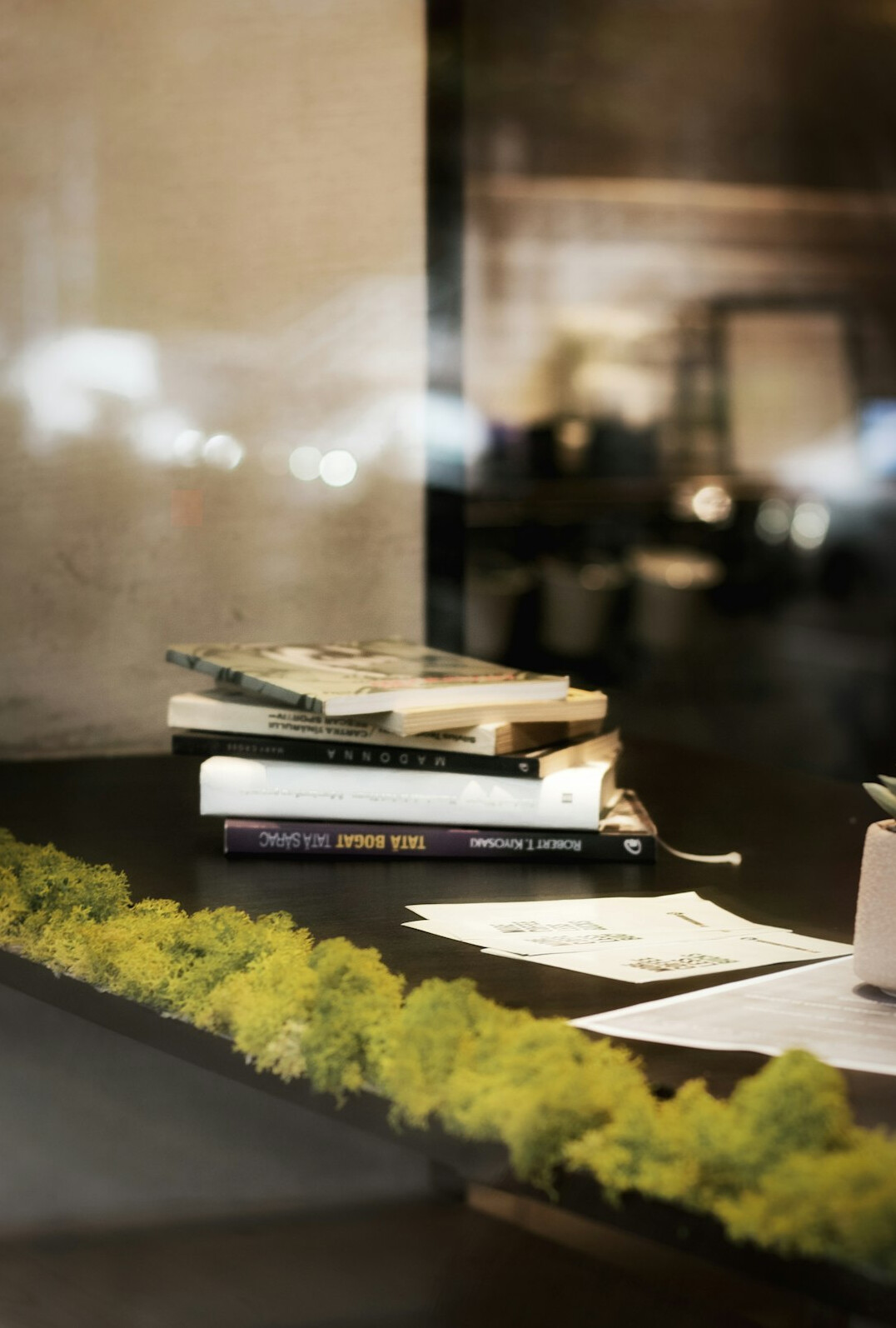 Documents and a pen on a wooden desk